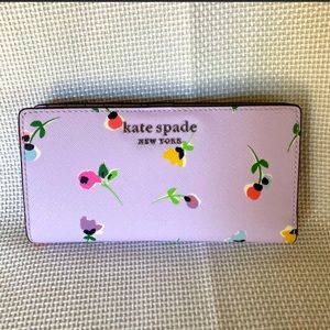 NWT Kate Spade Cameron Wildflower Ditsy large slim bifold wallet.